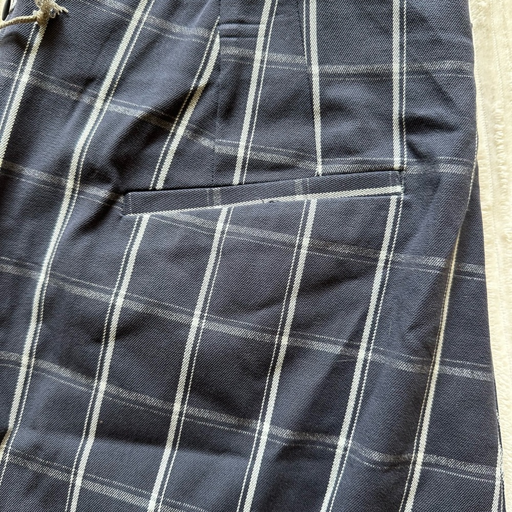 Navy with white checkered, stretchy waist pants. Size 18 with tags!